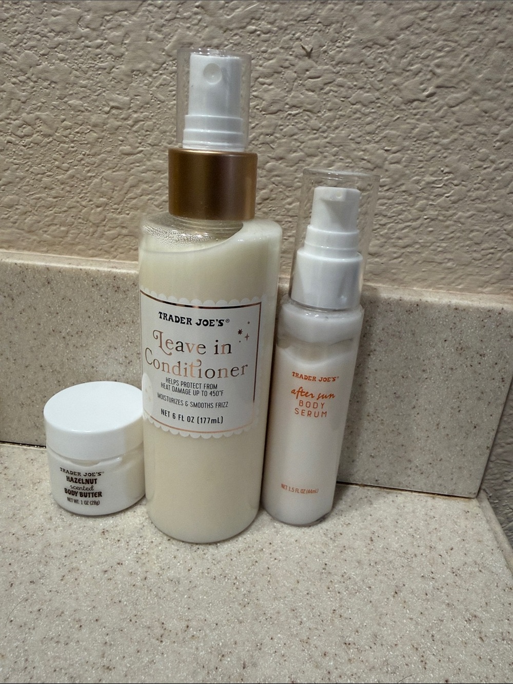 Trader Joe's Leave In Conditioner/After sun body serum/Hazelnut body butter.